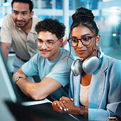 Office, programmer and group with computer, discussion and ...