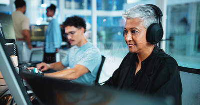 Buy stock photo Office, businesswoman and headphones with computer for web development, coding and listening to music. Coworking, night and mature developer with digital for programming, software update and podcast