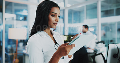 Buy stock photo Woman, developer and reading on tablet in office for IT, coding software and server update. Female person, digital or testing app of online programming, website application and troubleshooting system
