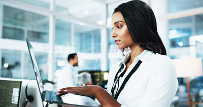 Buy stock photo Woman, developer and typing on laptop in office for programming, coding support and server update. Person, online app and IT for testing system, website application and troubleshooting at call center