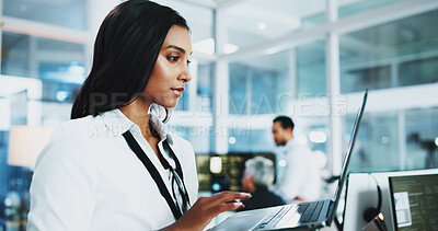 Buy stock photo Woman, developer and reading on laptop in office of programming, coding support and server update. Person, online app and IT for testing system, website application and troubleshooting at call centre