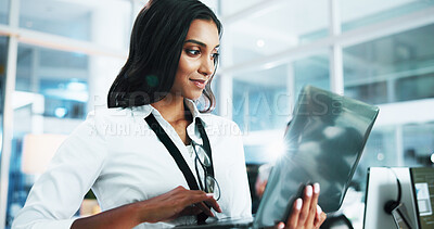Buy stock photo Happy, woman and developer with laptop in office of programming, coding support and server update. Person, online app and IT for testing system, website application and troubleshooting at call centre