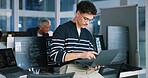 Man, programmer and office with laptop for coding, software development or app design. Male person, coder or developer with computer or technology for cybersecurity, web or IT services at workplace