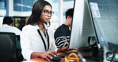 Buy stock photo Woman, developer and typing on computer in office for programming, software update and troubleshooting. Person, pc and coding for website development, testing server and monitor of system application