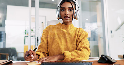 Buy stock photo Woman, headset and writing at office with consulting, notes or portrait for technical support at IT startup. Person, agent and voip headphones for virtual advisory services, pc or help desk in Mexico