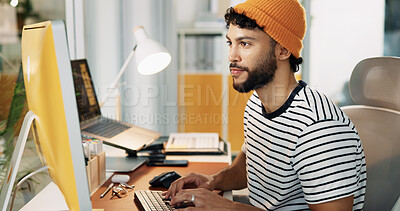 Buy stock photo Reading, computer and typing with business man in office or creative newsletter, publication or planning. Email marketing, subscription campaign and copywriting editor with person in startup agency