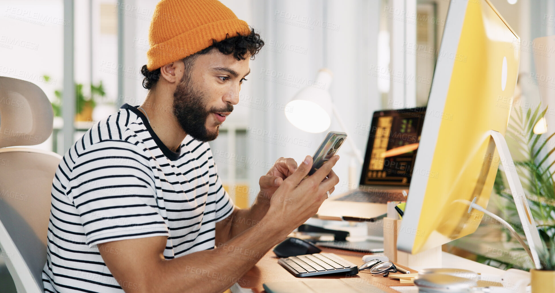 Buy stock photo Man, phone and excited in office with good news for project management at web design company. Person, technology and smile for agreement, positive review and feedback negotiation at creative agency
