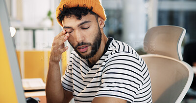 Buy stock photo Creative, tired and man with burnout in office for web development deadline, overworked and brain fog. Designer, employee and exhausted at agency for website testing crisis, overwhelmed or eye strain