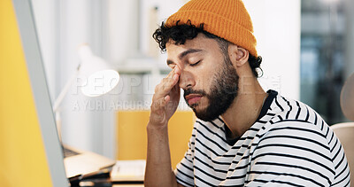Buy stock photo Creative, tired and man with fatigue in office for web development deadline, overworked and brain fog. Designer, employee and exhausted at agency for website testing crisis, overwhelmed or eye strain