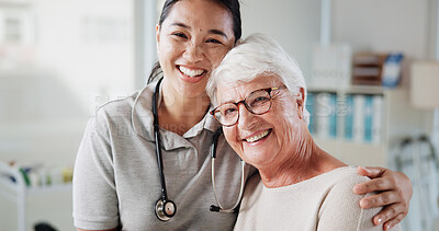 Buy stock photo Elderly woman, physiotherapist and hug in portrait at hospital with smile, recovery or medical services. People, senior patient and embrace for wellness, happy or support in rehabilitation at clinic