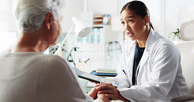 Buy stock photo Senior patient, doctor and holding hands for support, healthcare or cancer diagnosis on tablet. Medical professional, conversation or comfort elderly woman for bad news, kindness or empathy in clinic