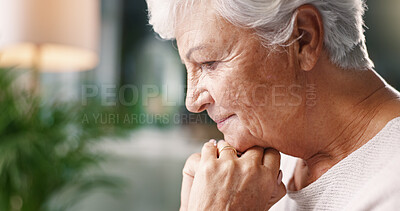 Buy stock photo Senior woman, sad and thinking in home for loneliness, remember memory and past decision. Thoughts, elderly person and regret in living room for reflection, dementia and alzheimers in profile
