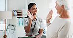 Senior woman, physiotherapist and high five with smile, support and results for recovery at clinic. People, elderly patient and doctor with tablet for report, progress and rehabilitation for injury