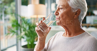 Buy stock photo Home, drinking water and senior woman in lounge, wellness or hydration with morning routine. Nutrition, pensioner or elderly person in living room, liquid or aqua with health in retirement or thirsty