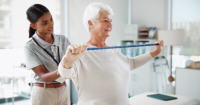 Buy stock photo Senior woman, physiotherapist and resistance band with help, smile and healthcare services for recovery. People, happy and exercise with equipment, stretching and injury for rehabilitation at clinic
