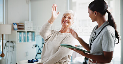 Buy stock photo Senior woman, physiotherapist and happy with high five, support and results for recovery at clinic. People, elderly patient and doctor with tablet for report, progress and rehabilitation for injury