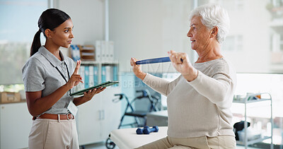 Buy stock photo Elderly woman, physiotherapist and resistance band with tablet, counting and healthcare services for recovery. People, happy and exercise with stretching, app and injury for rehabilitation at clinic