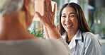 Happy woman, healthcare and high five with senior patient for winning, good job or teamwork at hospital. Excited, female person or touch with smile for elderly care, success or positivity at clinic