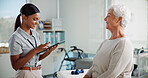 Physiotherapy, tablet and woman with mature patient with medical results, consulting and mobility. Physical therapy, chiropractor and person on digital tech for diagnosis, treatment or rehabilitation