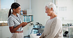 Physiotherapy, tablet and happy woman with mature patient with medical results, consulting and mobility. Physical therapy, chiropractor and person on digital tech for diagnosis, treatment or recovery