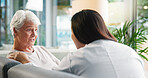 Consulting, doctor and senior patient with support, women and checkup for healthcare, talking and ill. Clinic, medical professional and care for elderly person with dementia, sickness and diagnosis
