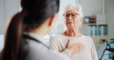 Buy stock photo Consulting, chest pain and healthcare with old woman and doctor for cardiac rehabilitation, heart arrhythmia or medical. Cardiologist, help and advice with people for healing and breathing exam