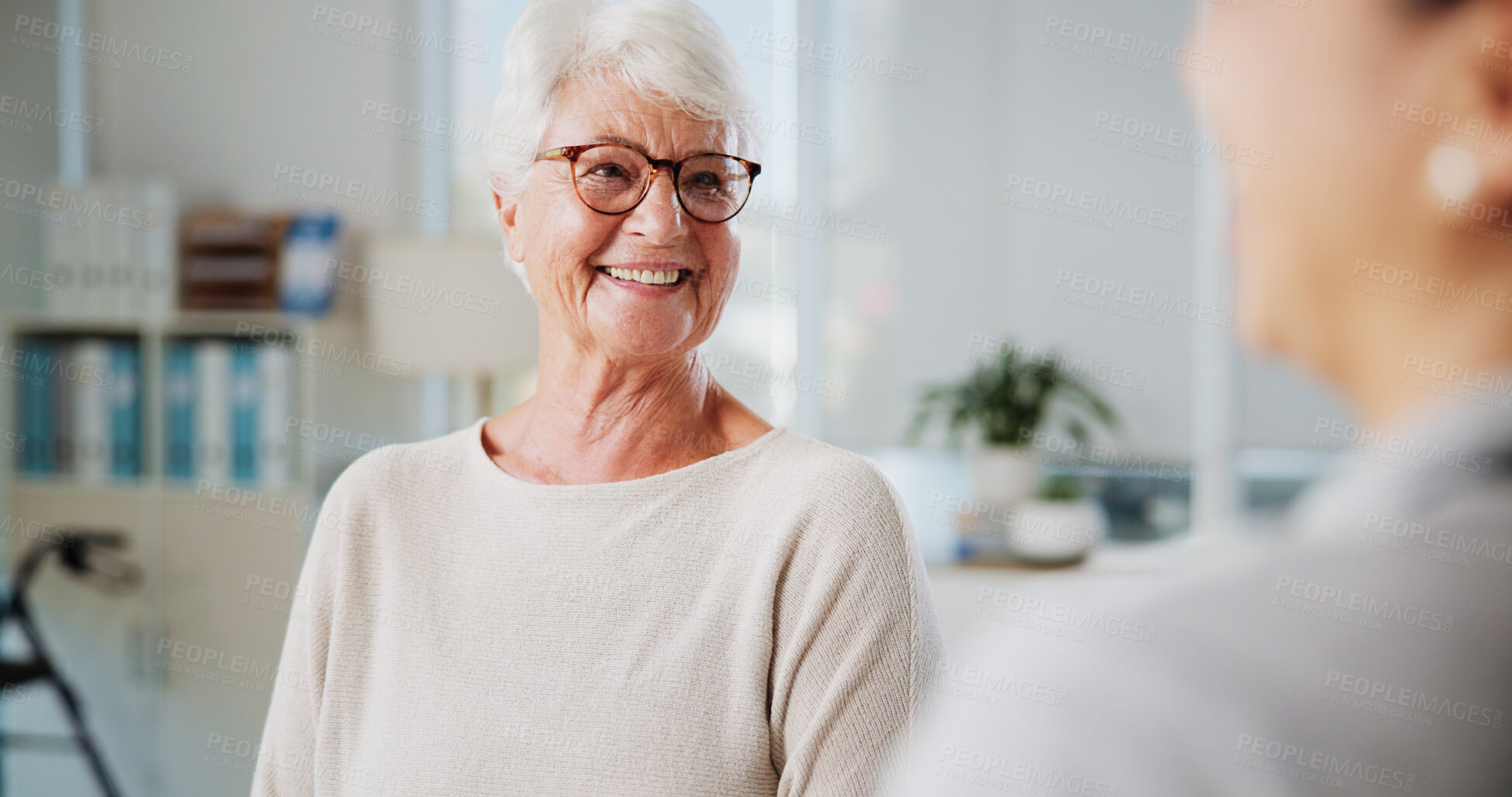 Buy stock photo Physiotherapy, smile and senior woman in office, conversation and help with feedback. Professional, medical and elderly patient with appointment, recovery and healing with discussion and healthcare