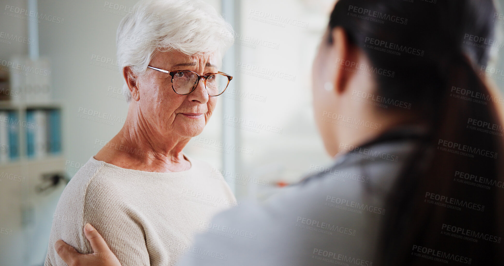 Buy stock photo Sad woman, doctor and empathy in clinic, healthcare and consultation with support, help and talking. Pensioner, senior patient or medical with professional, results and sympathy with stress or cancer