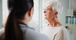 Sad woman, doctor and empathy in hospital, healthcare and consultation with support, cancer diagnosis and talking. Stress, senior patient or medical with help, test results and sympathy with feedback