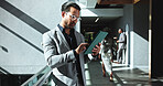 Business, man and reading tablet in office building for financial report review, investment account and research. Finance manager, person and digital app at work for revenue proposal and forecasting