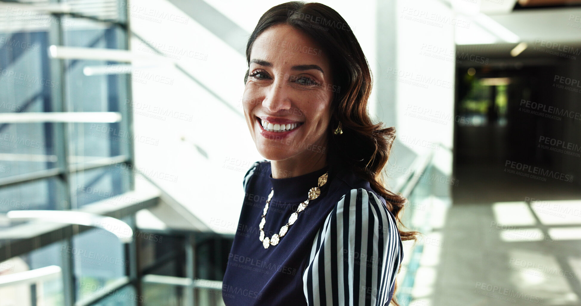 Buy stock photo Portrait, smile and business woman in company for finance, investment and career experience as actuary. Job, professional and happy worker in office with confidence as risk analyst in hallway in USA