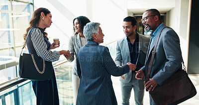 Buy stock photo Office, meeting and business people with handshake in lobby for agreement, welcome and partnership. Corporate, professional and men and women shaking hands for teamwork, collaboration and thank you