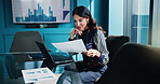 Business, woman and reading document in office for finance review, data analysis and graph for growth. Thinking, accountant and laptop with financial report, profit charts and information for budget