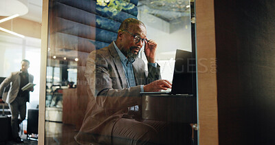 Buy stock photo Laptop, planning and typing with business black man in pod for financial reporting. Computer, reading and research with mature African employee in cubicle of hotel lobby for accounting or finance