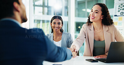 Buy stock photo Handshake, meeting and business women with smile in interview for recruitment, deal or welcome. Happy, thank you and human resources employee shaking hands with a worker for onboarding or agreement