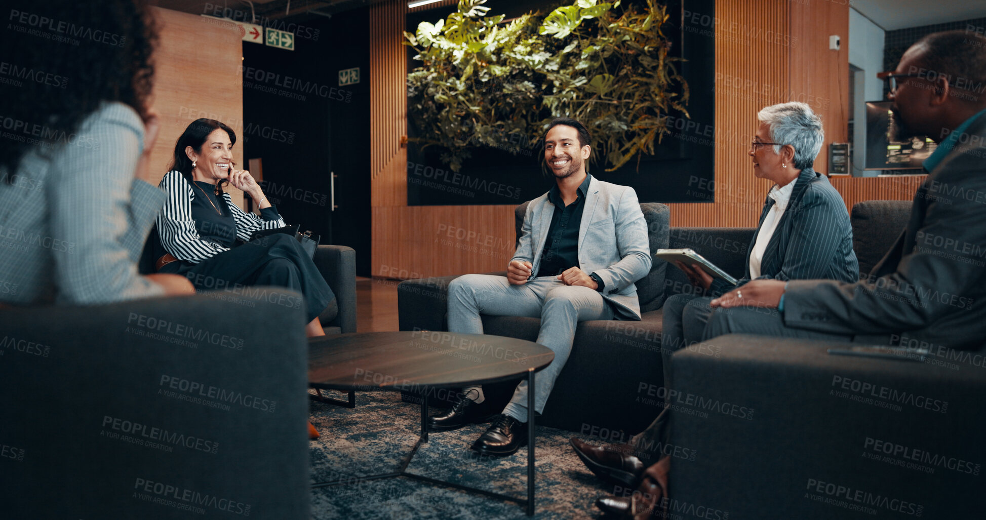 Buy stock photo Meeting, smile and training with business people in lobby of office for planning or partnership. Coaching, collaboration and conversation with happy employee team in workplace for report or research