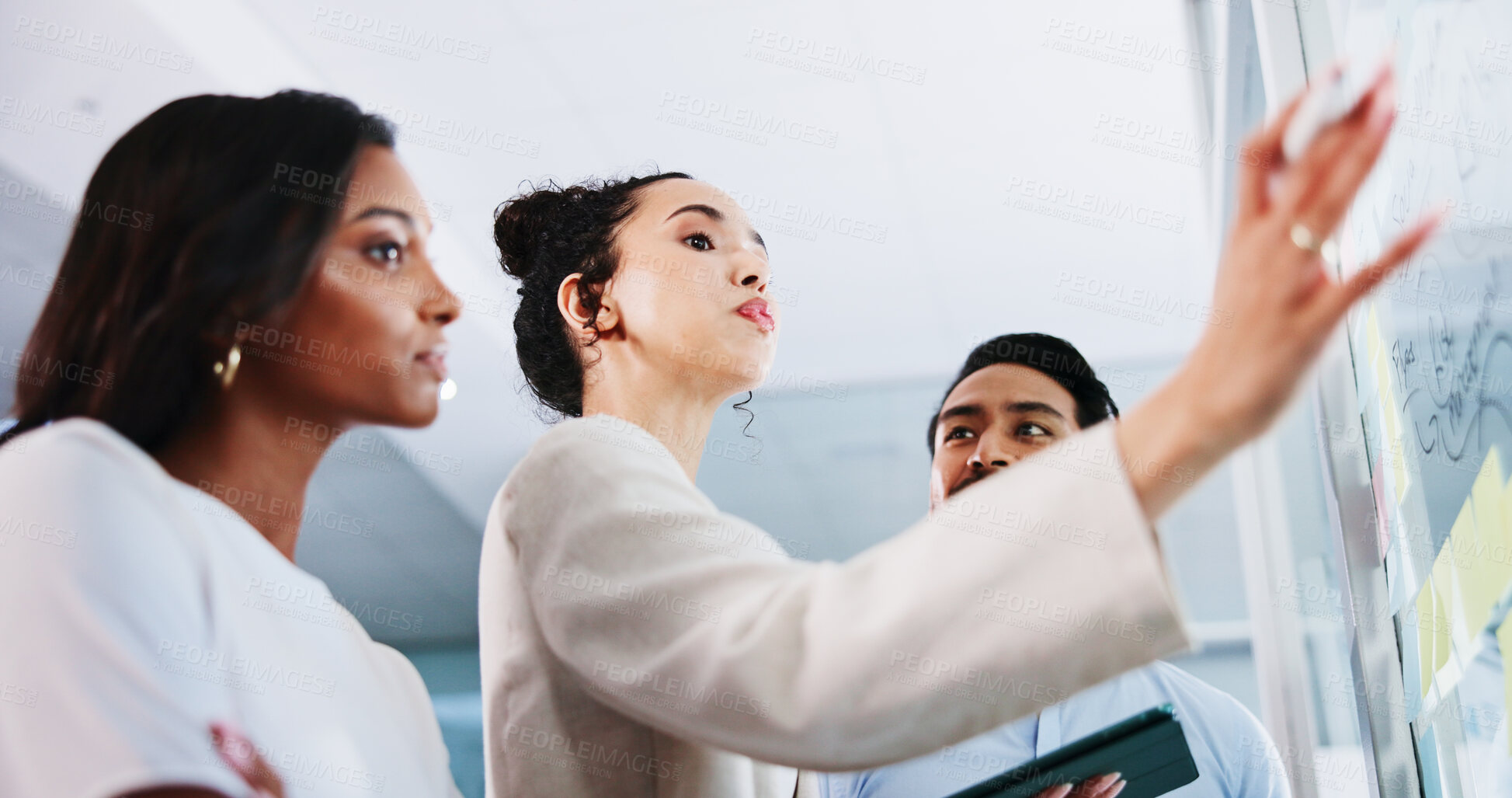 Buy stock photo Glass wall, below and business people in office, planning and conversation for social media subscription. Employees, teamwork and PR agency with ideas, low angle and support for proposal and feedback