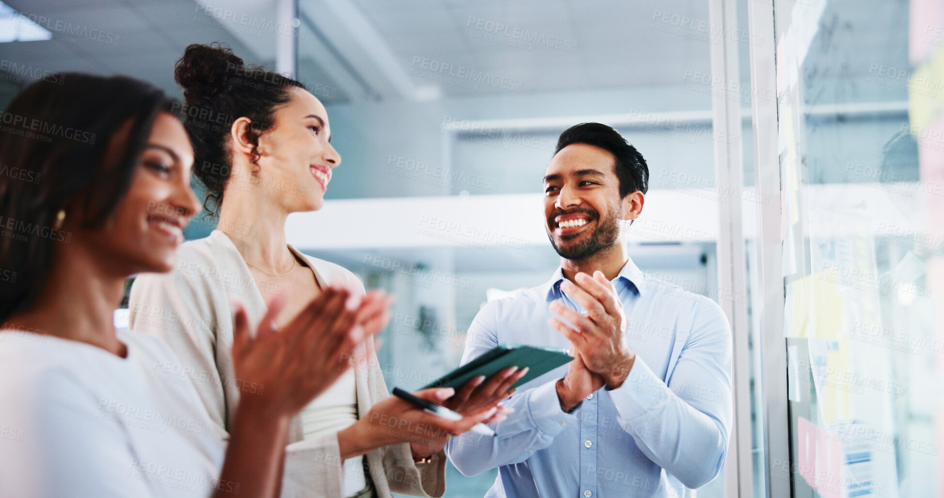 Buy stock photo Glass wall, tablet and business people with applause, planning and celebration for ideas. Employees, feedback or PR agency with brainstorming, clapping and promotion with tech, smile or profit growth