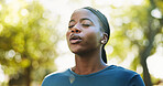 Meditation, breathe and black woman in park for mindfulness, healing aura or spiritual mental health. Zen, 
African girl and peaceful in nature with fresh air, energy balance or relax chakra outdoors