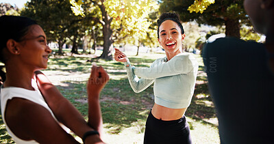 Buy stock photo Park, smile and women stretching outdoor with friendship, talking or wellness exercise. Sport, fitness and group of female athletes with arm warm up for health activity with conversation in nature