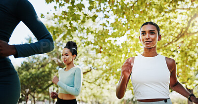 Buy stock photo Women, running friends and workout in park with teamwork, exercise or support for endurance. Athlete, runner and fitness with marathon, training or development in nature for wellness and health goal