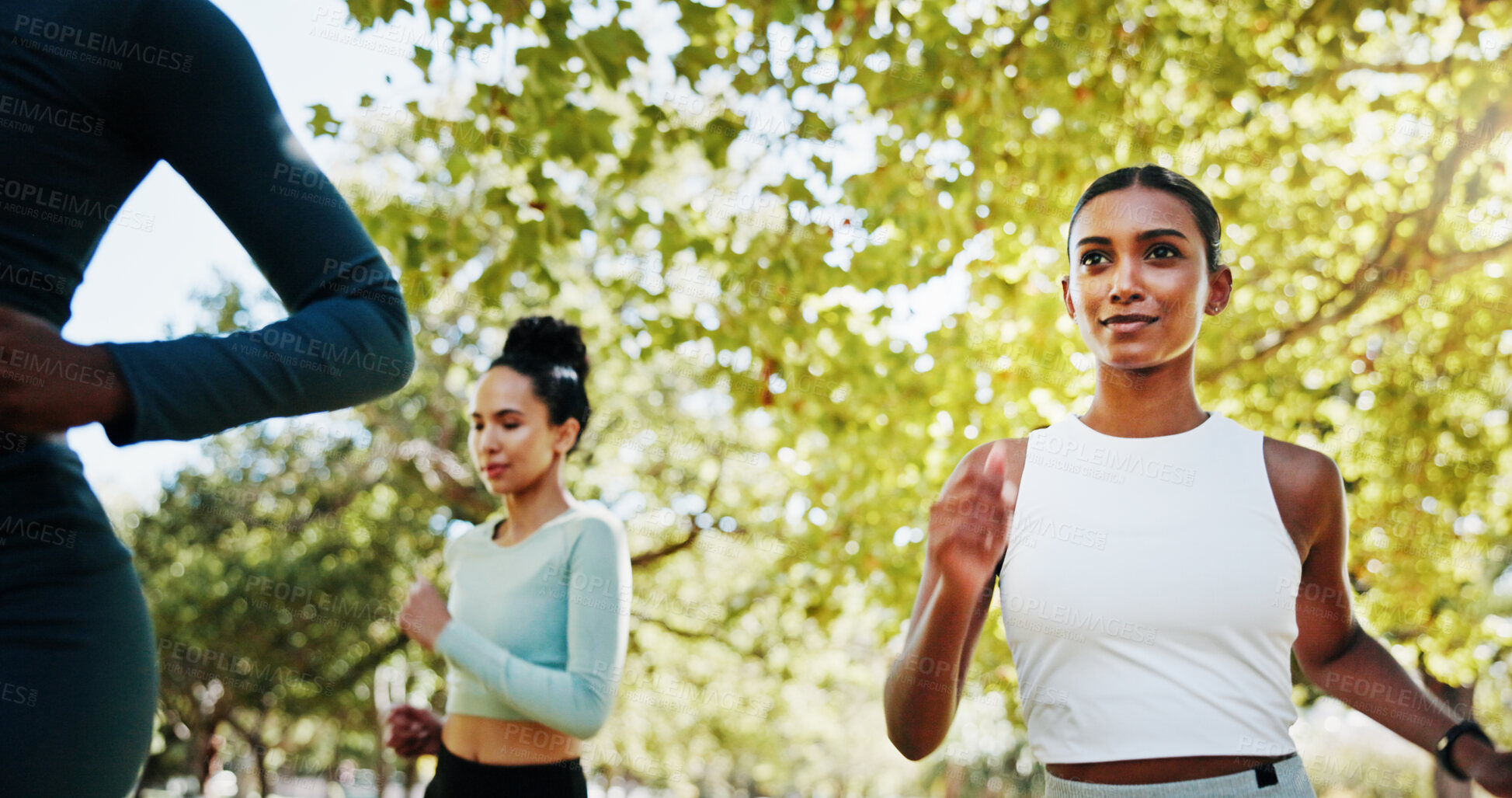 Buy stock photo Women, running friends and workout in park with teamwork, exercise or support for endurance. Athlete, runner and fitness with marathon, training or development in nature for wellness and health goal
