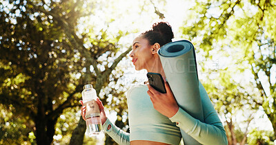 Buy stock photo Fitness, woman and smile with yoga mat at park for wellness exercise, water bottle or ready for pilates. Below, person or phone with equipment in nature for health routine, start workout or fresh air
