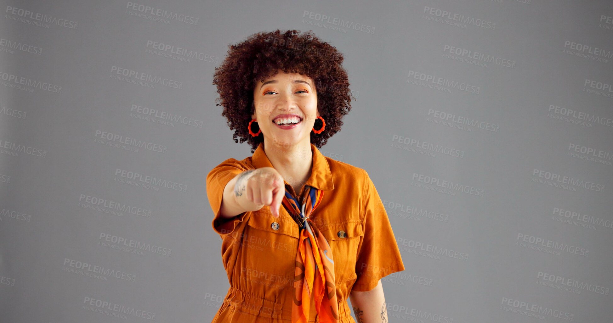 Buy stock photo Woman, fashion and point at you in studio, portrait and happy with decision, choice and space by background. Person, model and smile with vintage style for selection with call to action in Colombia