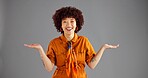 Portrait, open hands and woman with smile, choice and selection on grey studio background. Face, person and model with gesture, questions and shrug with decision, mockup option and offer with opinion