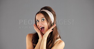 Buy stock photo Portrait, surprise and woman in studio, smile and facial expression on grey background. Face, happy person and model with omg, shocked or cheerful with joy, winning or emoji with announcement or sale