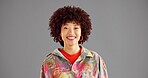 Urban, fashion and studio portrait of woman with smile, confidence and cool afro style at university. Happy, space and student girl with streetwear, mockup and positive attitude on grey background