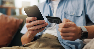 Buy stock photo Man, hands and mobile with credit card for online shopping, ecommerce and bill payment portal in home. Customer, tech and debit transaction on sofa for cart checkout, banking app and virtual purchase