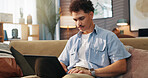 Remote work, man and laptop in home for research, email draft or creative writing on sofa. Freelance writer, tech or connectivity in living room for article editing, proofreading story or publication