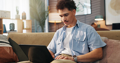 Buy stock photo Remote work, man and laptop in home for research, email draft or creative writing on sofa. Freelance writer, tech or connectivity in living room for article editing, proofreading story or publication